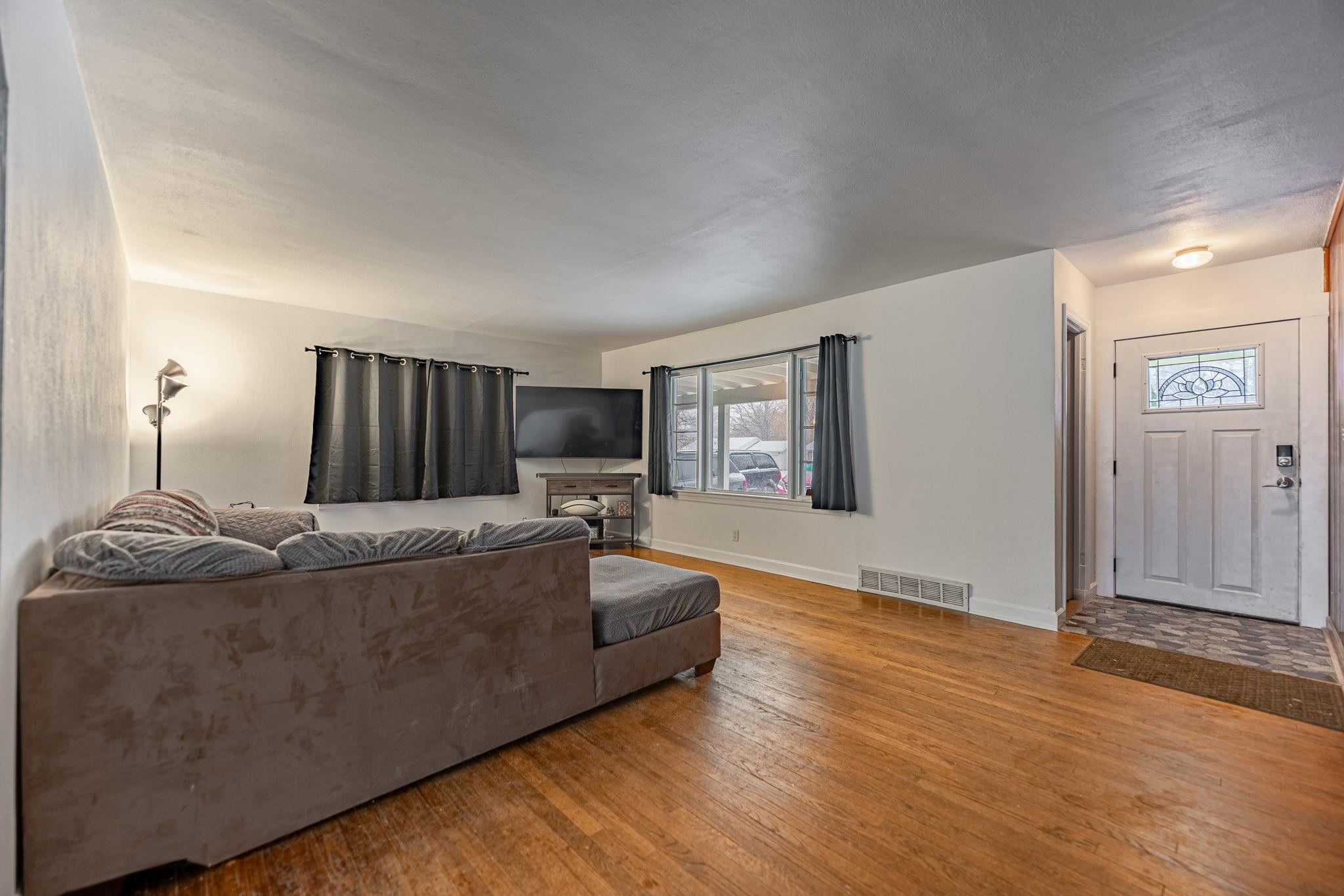 1924 North Alpine Road Rockford, IL 61107 - Photo 6 of 20 a living room with furniture and a wooden floor