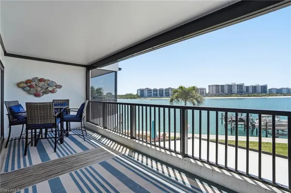 $619,900 | 309 La Peninsula Boulevard, Unit 309, Naples, FL 34113
