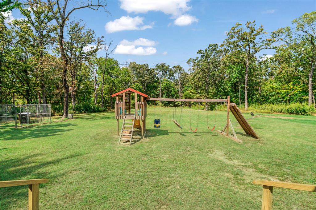 28 Private Road Sumner, TX 75486 - Photo 15 of 17 View of jungle gym