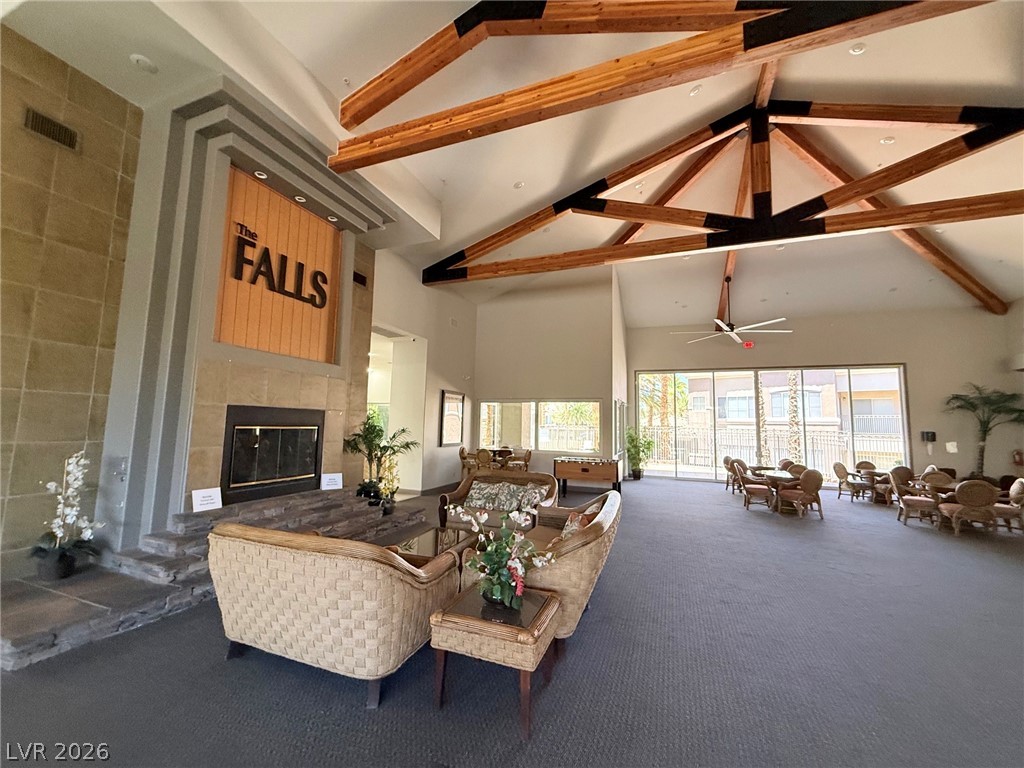 9050 West Warm Springs Road, Unit 2002 Las Vegas, NV 89148 - Photo 42 of 46 This communal space features a fireplace and offers ample room for gatherings.