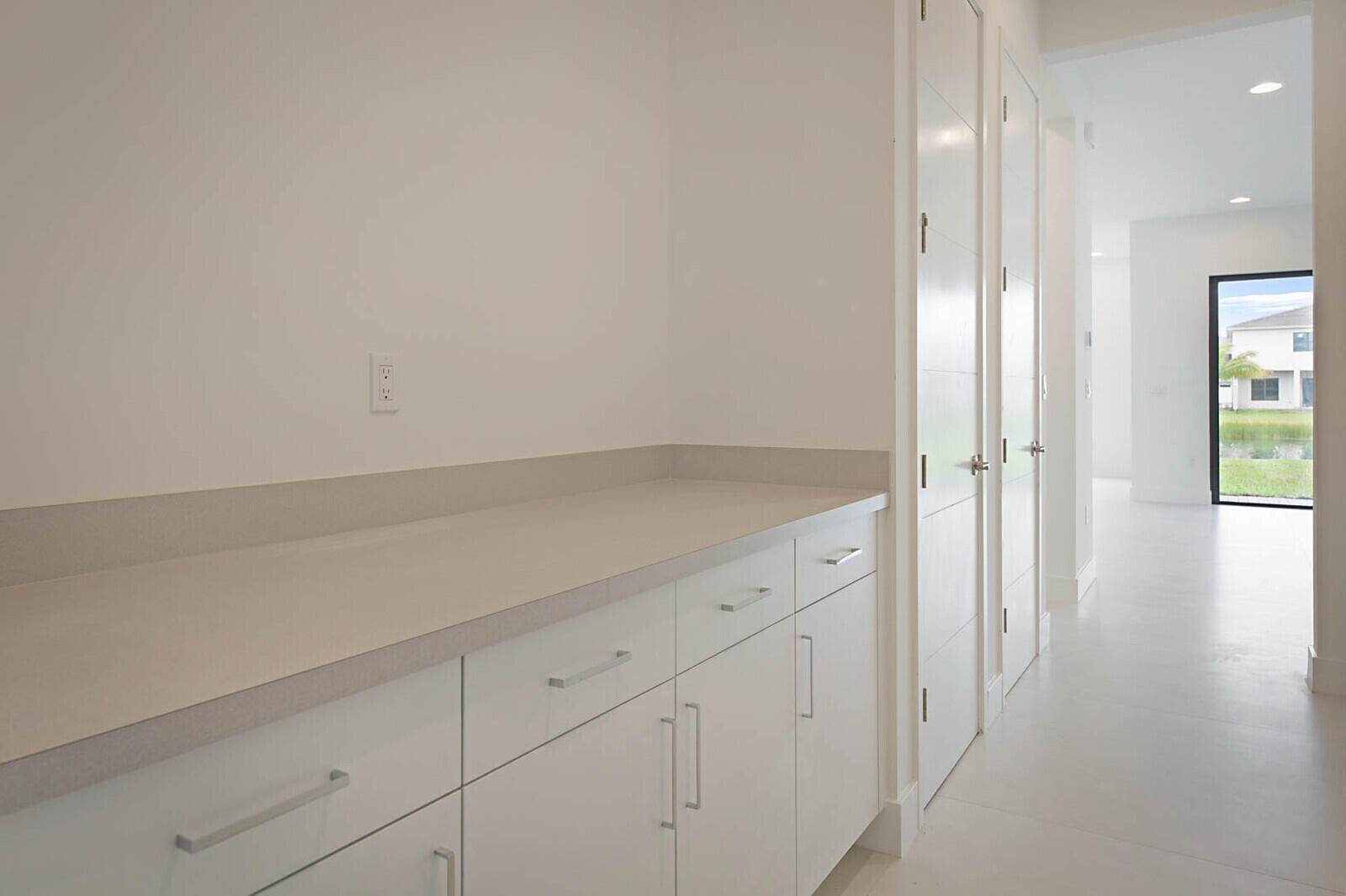 17062 Watersprite Lakes Road Boca Raton, FL 33496 - Photo 18 of 42 an empty room with wooden floor