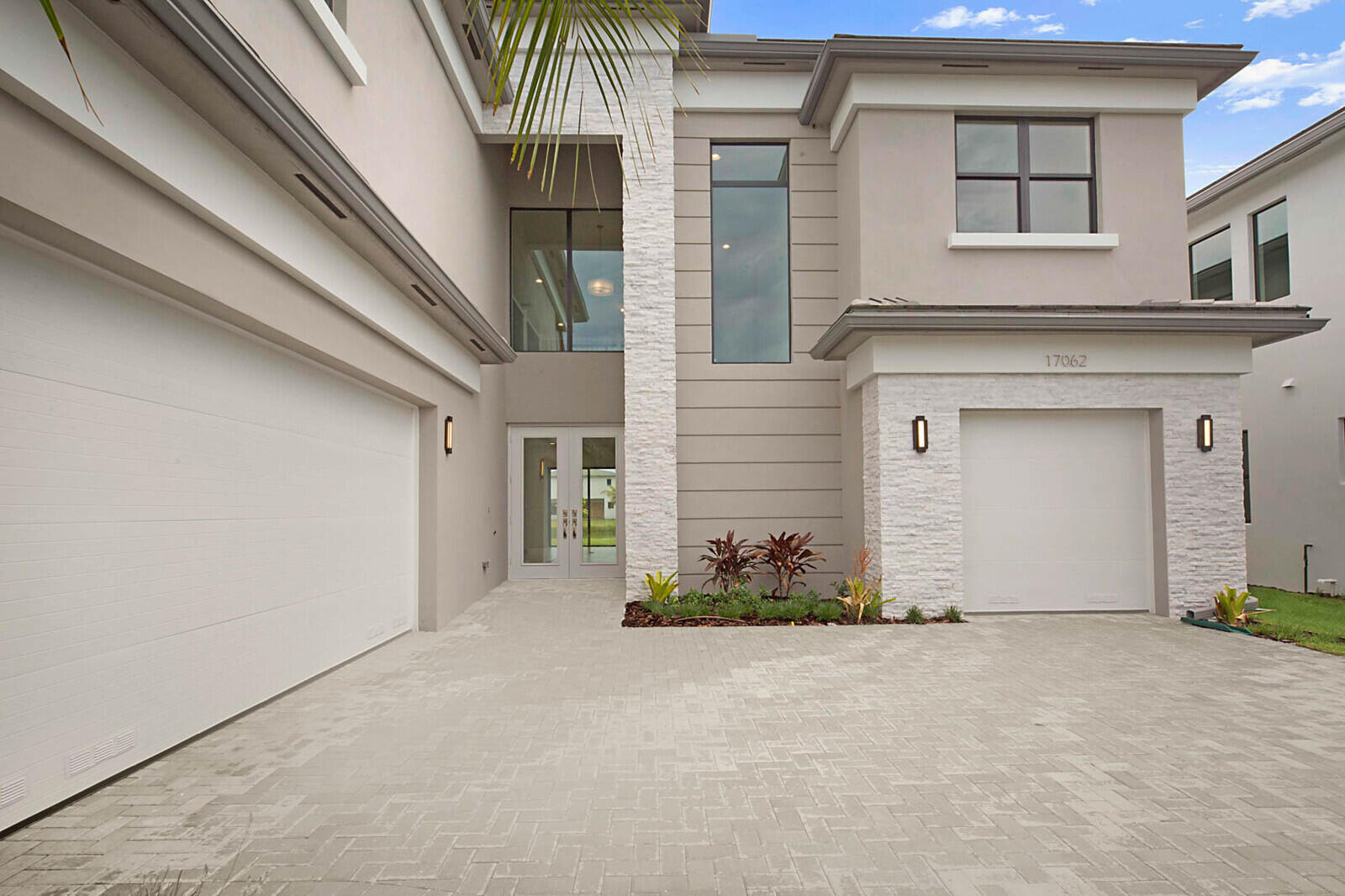 17062 Watersprite Lakes Road Boca Raton, FL 33496 - Photo 2 of 42 a view of a house with a outdoor space