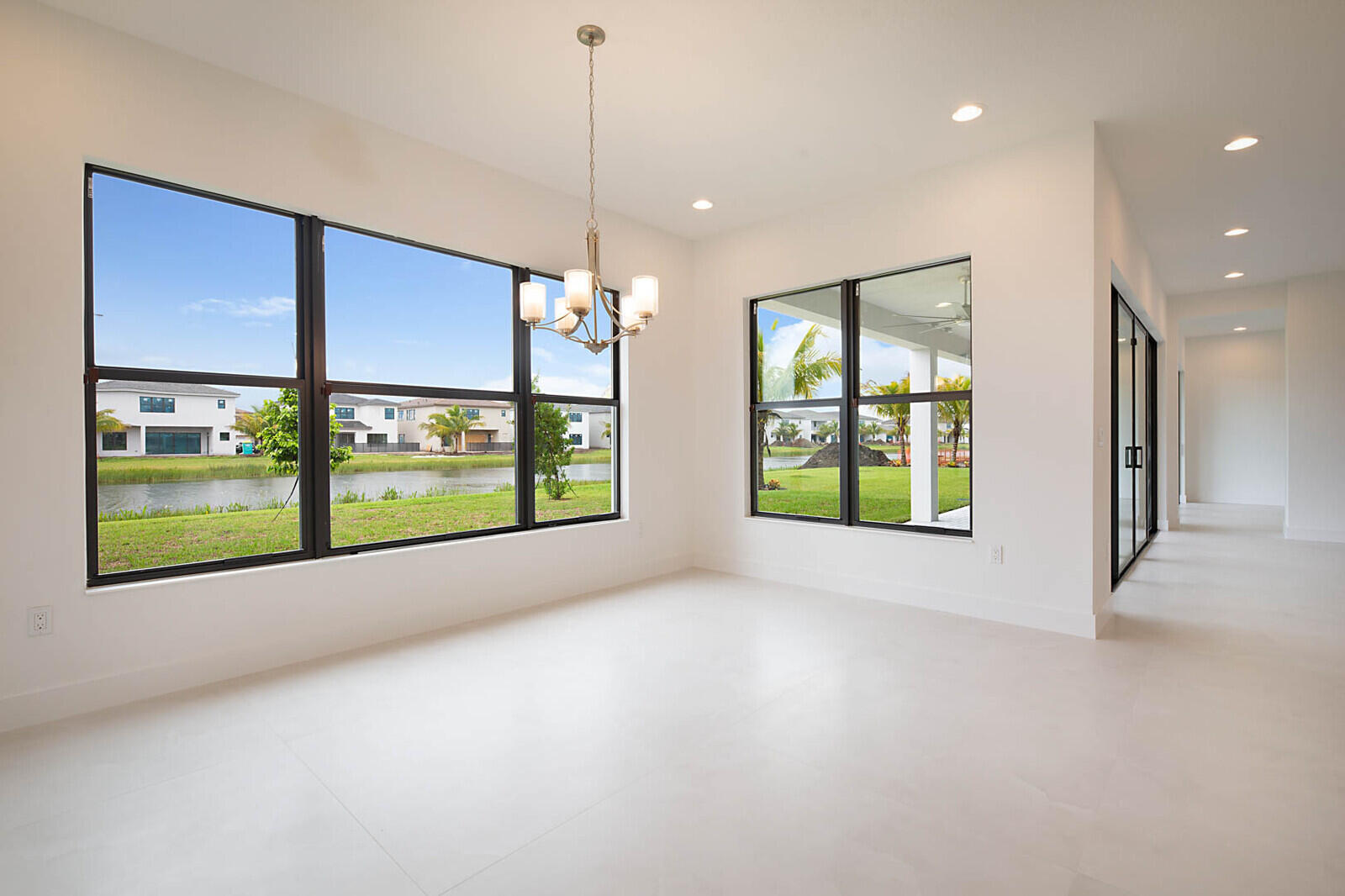 17062 Watersprite Lakes Road Boca Raton, FL 33496 - Photo 8 of 42 a view of an empty room with a window