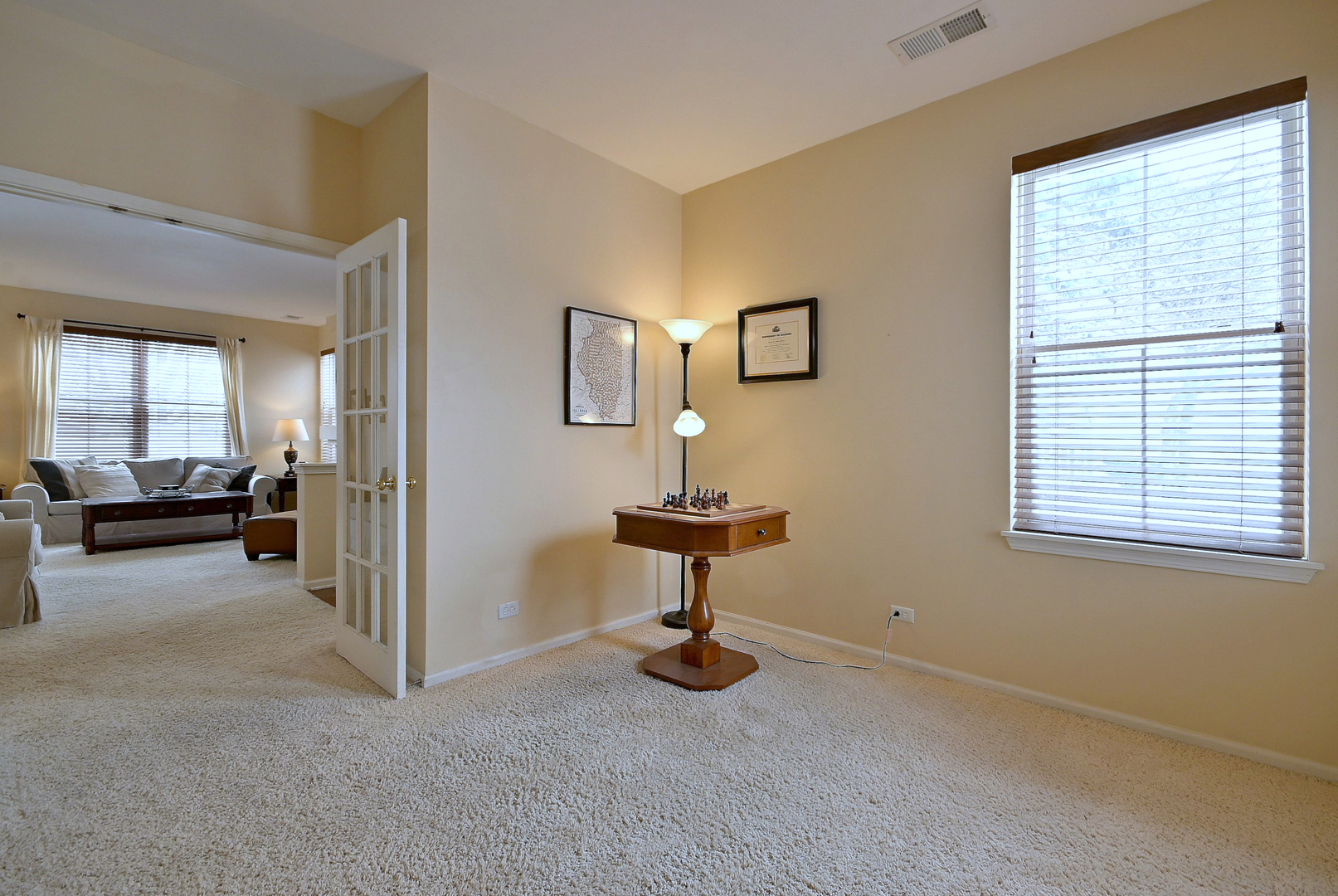266 Grand Ridge Road St. Charles, IL 60175 - Photo 13 of 29 a view of a livingroom with a furniture and windows