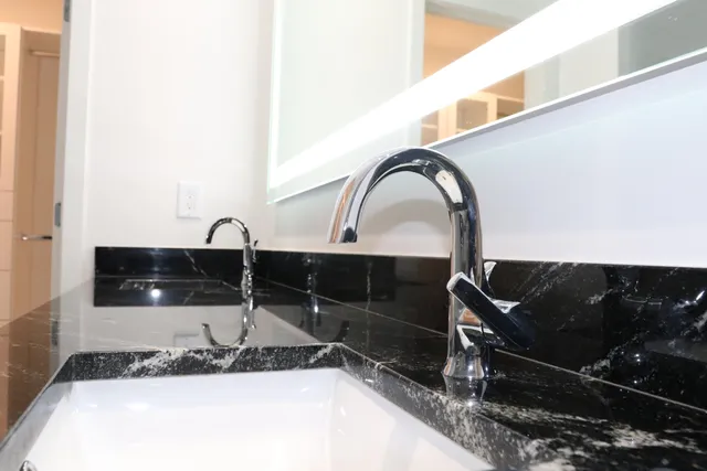 a view of hallway with a bathtub
