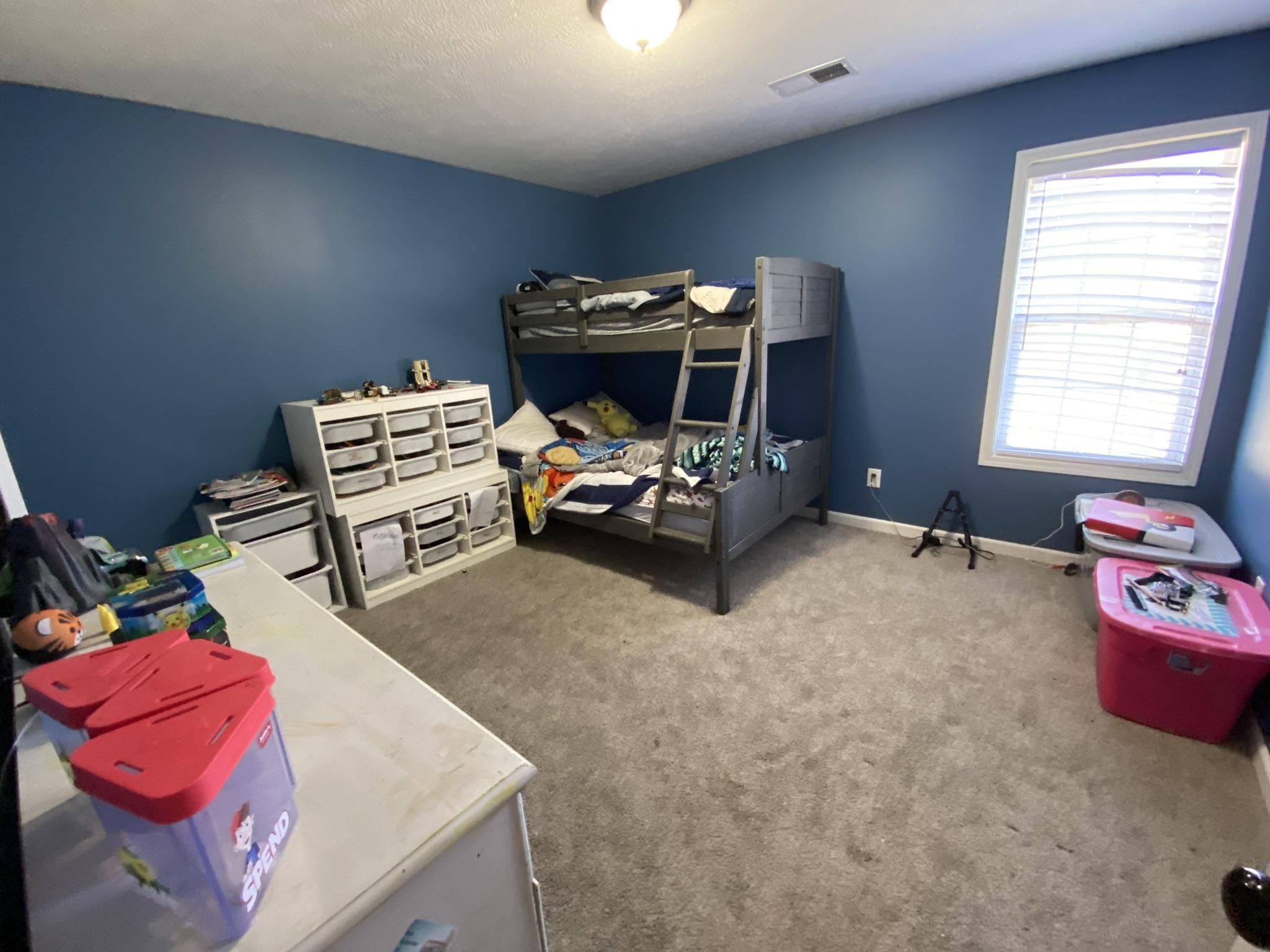845 Simmons Road Henderson, TN 38340 - Photo 14 of 21 a living room with furniture and a flat screen tv