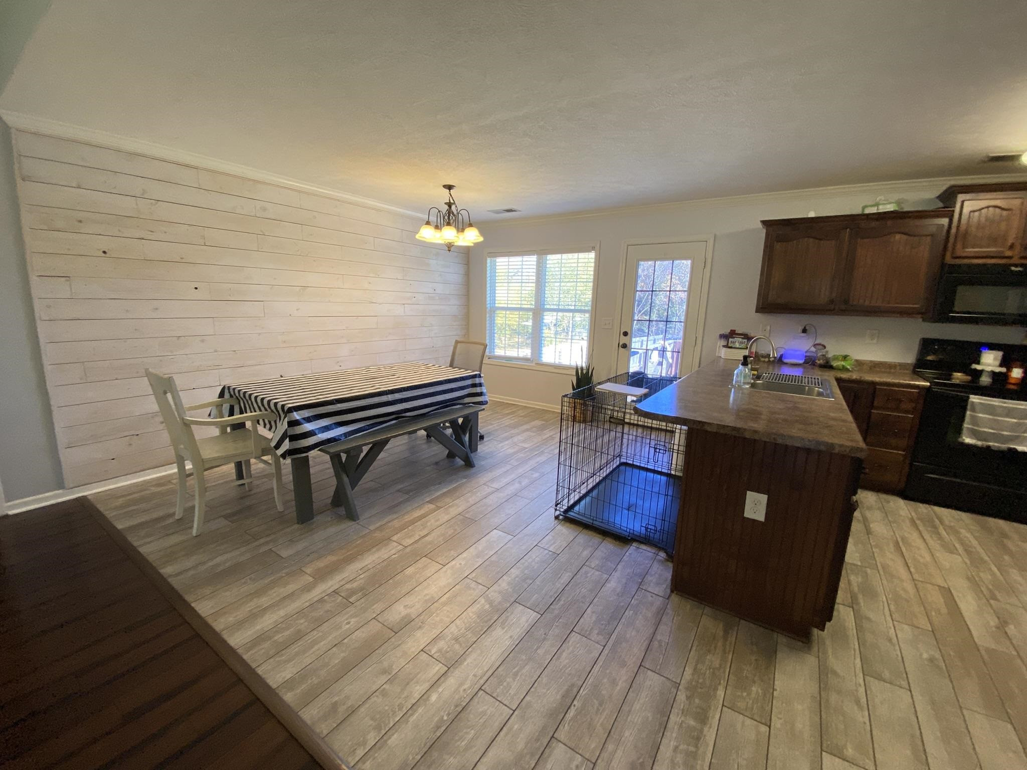 845 Simmons Road Henderson, TN 38340 - Photo 3 of 21 a living room with furniture and a flat screen tv