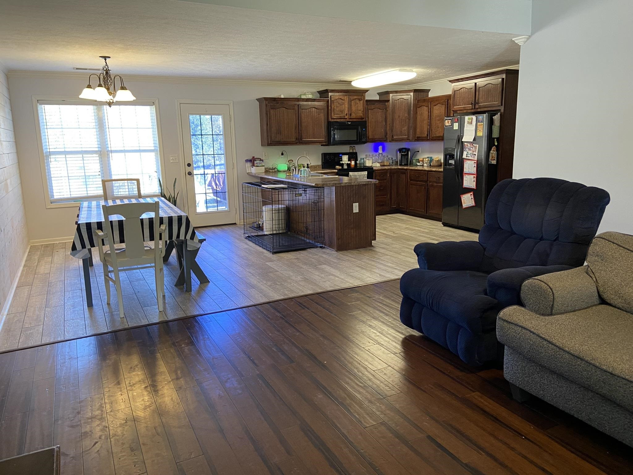 845 Simmons Road Henderson, TN 38340 - Photo 5 of 21 a living room with furniture and a wooden floor