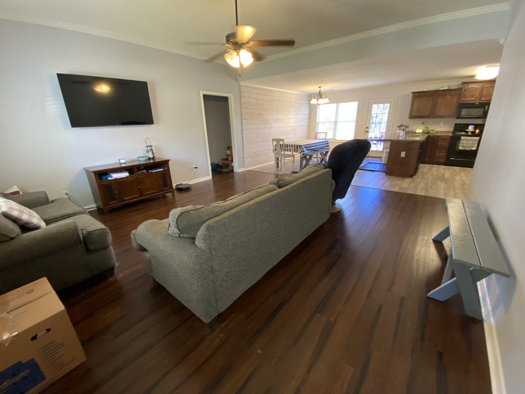 845 Simmons Road Henderson, TN 38340 - Photo 8 of 21 a living room with furniture and a flat screen tv