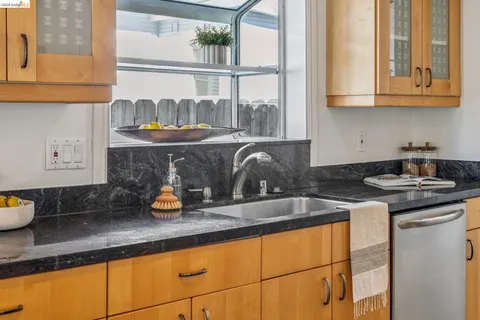 a view of an empty room with stairs