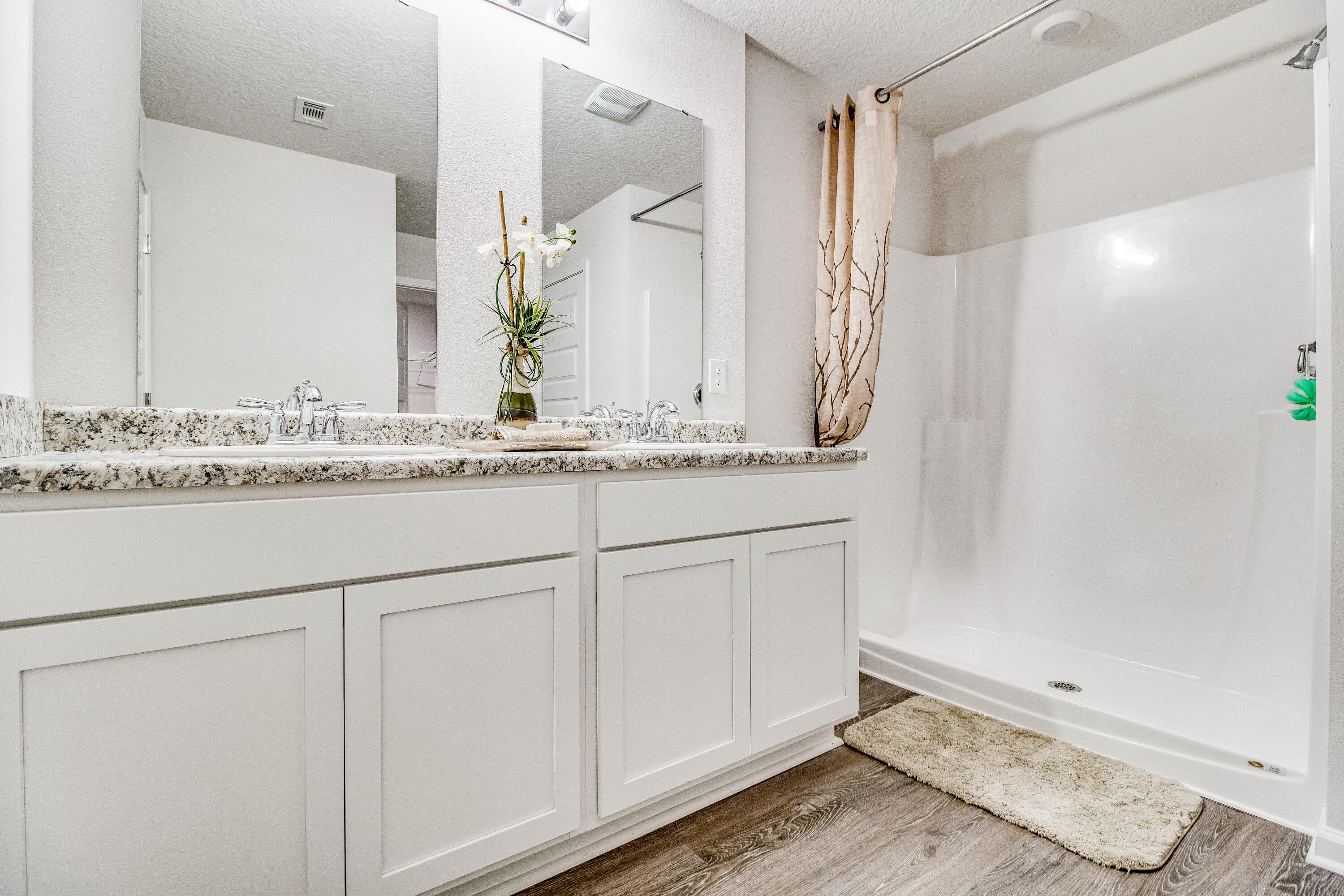 6629 Spyglass Hill Road Laurel Hill, FL 32567 - Photo 13 of 26 a bathroom with a sink and a mirror