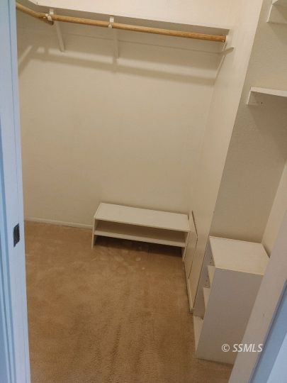1014 Sherri Street Ridgecrest, CA 93555 - Photo 7 of 23 a view of room with racks on the wall