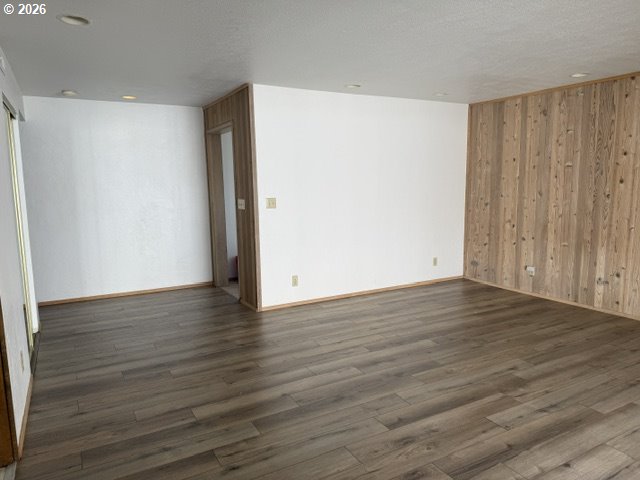2164 24th Street Florence, OR 97439 - Photo 22 of 42 a view of an empty room with wooden floor