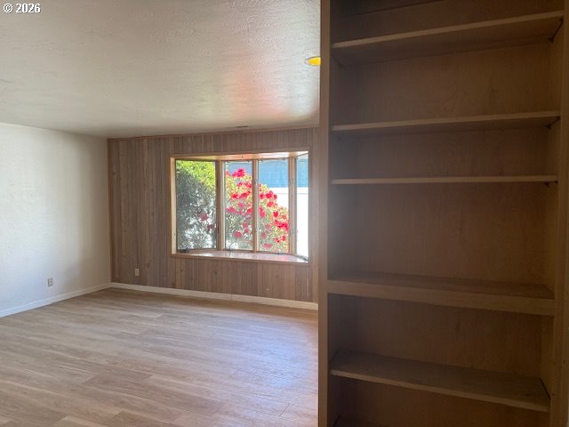 2164 24th Street Florence, OR 97439 - Photo 33 of 42 a view of room with window and hardwood floor