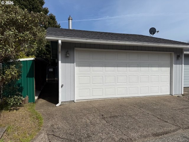 2164 24th Street Florence, OR 97439 - Photo 6 of 42 a view of an empty room with a garage