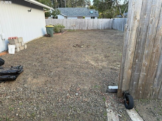 2164 24th Street Florence, OR 97439 - Photo 9 of 42 a view of a backyard