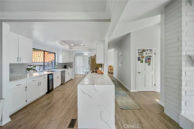 a bedroom with a bed and a table in it