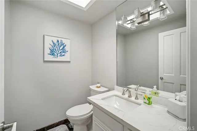 a view of city and mountain from a balcony