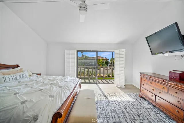 a view of a chairs and table on the balcony