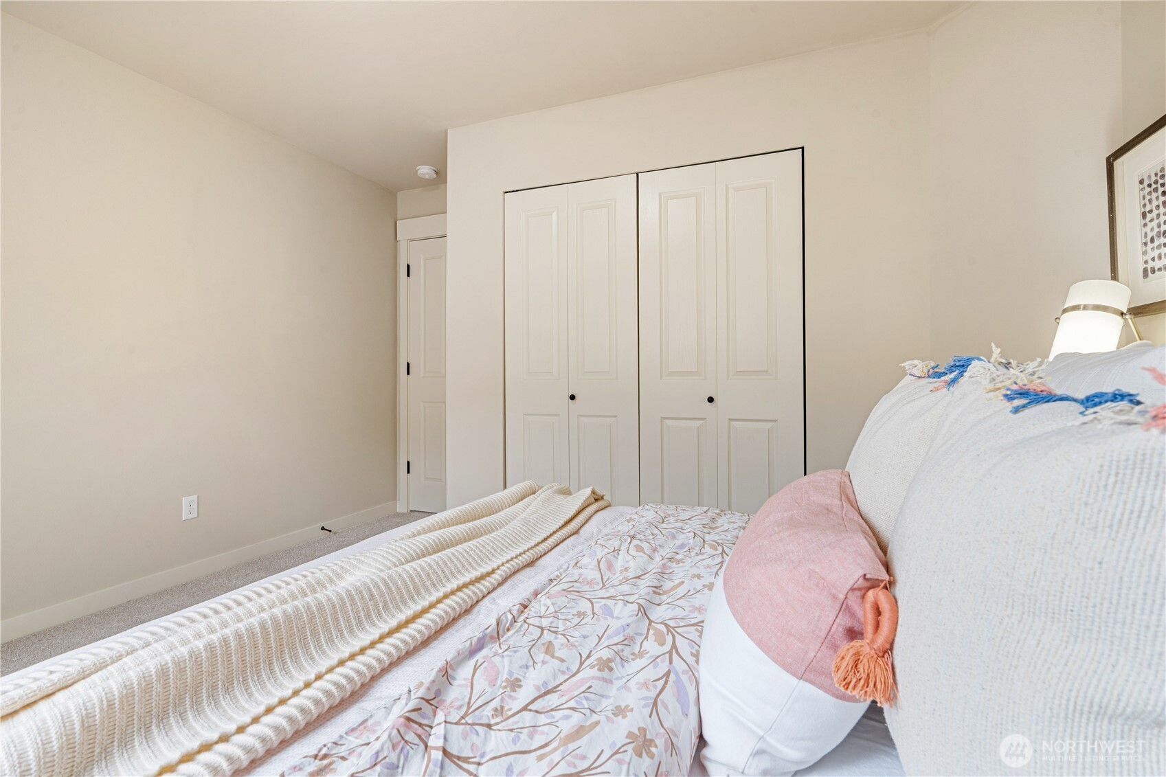 22811 36th Drive Southeast Bothell, WA 98021 - Photo 26 of 34 a bedroom with a bed and a lamp