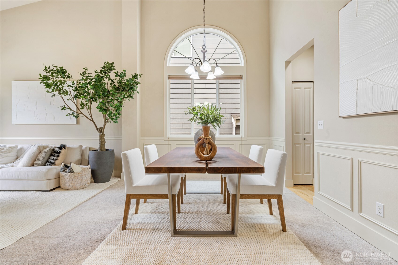 22811 36th Drive Southeast Bothell, WA 98021 - Photo 5 of 34 a view of a dining room with furniture and a potted plant