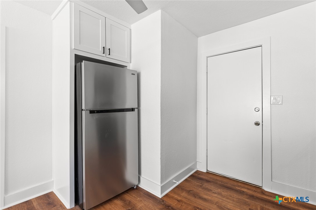 1020 South 23rd Street Temple, TX 76504 - Photo 13 of 38 a view of a room with wooden floor and closet