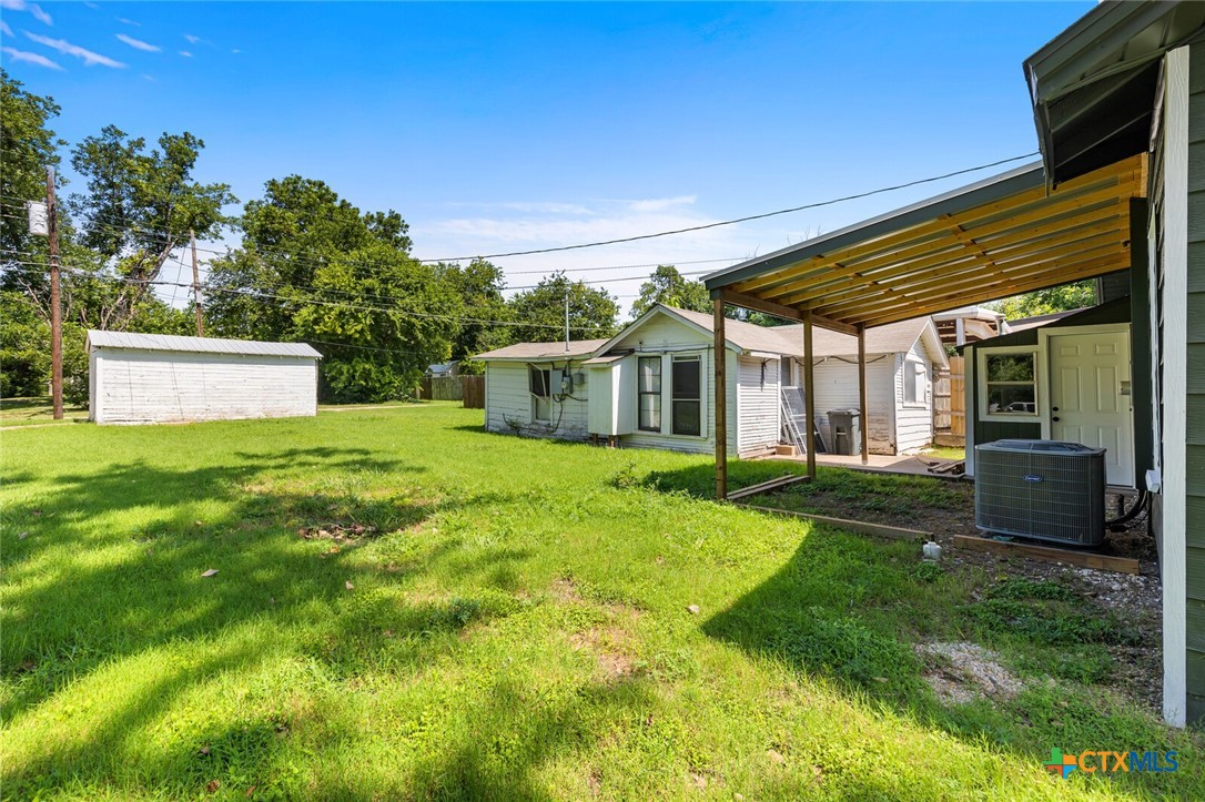 1020 South 23rd Street Temple, TX 76504 - Photo 28 of 38 a view of a house with a backyard