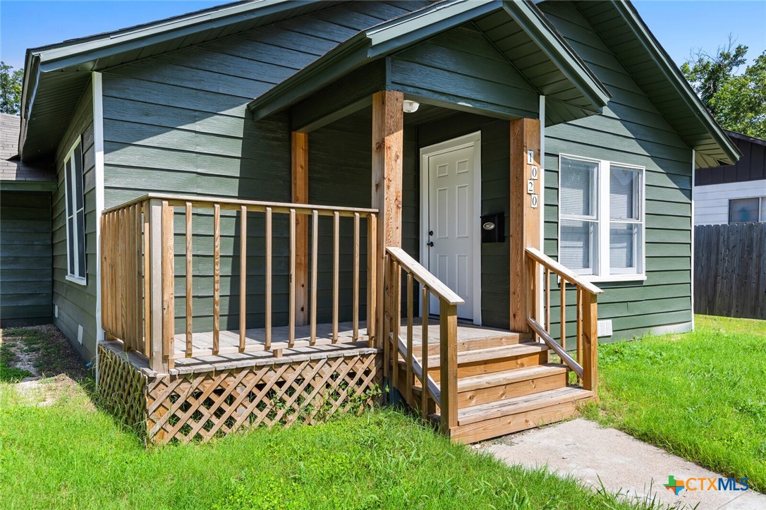 1020 South 23rd Street Temple, TX 76504 - Photo 7 of 38 a view of a house with wooden fence and a stairs