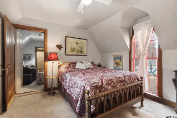 a kitchen with stainless steel appliances granite countertop a sink and a refrigerator