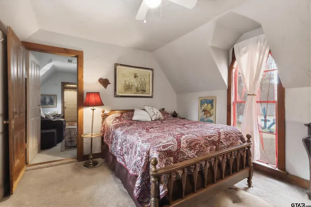 a kitchen with stainless steel appliances granite countertop a sink and a refrigerator