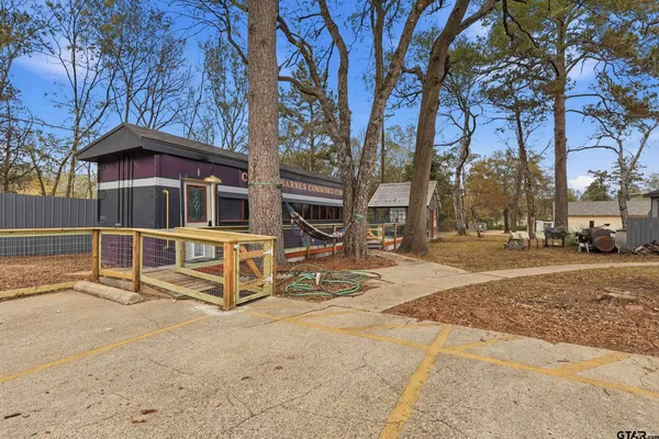 a view of a chairs and tables in the patio