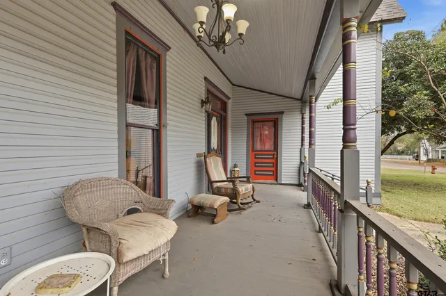 an aerial view of a house with outdoor space