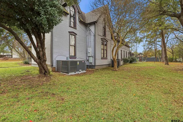 a view of swimming pool with sitting area