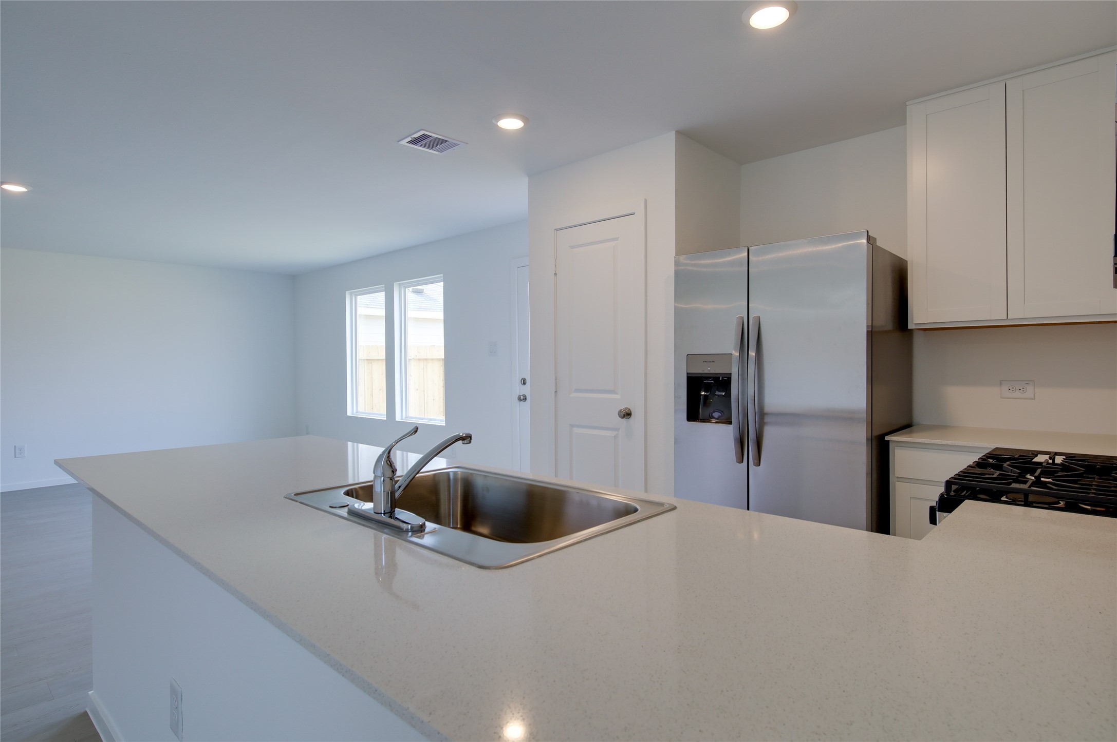 10915 Tawny Rdg Drive Beasley, TX 77417 - Photo 11 of 33 a kitchen with stainless steel appliances a refrigerator and a sink
