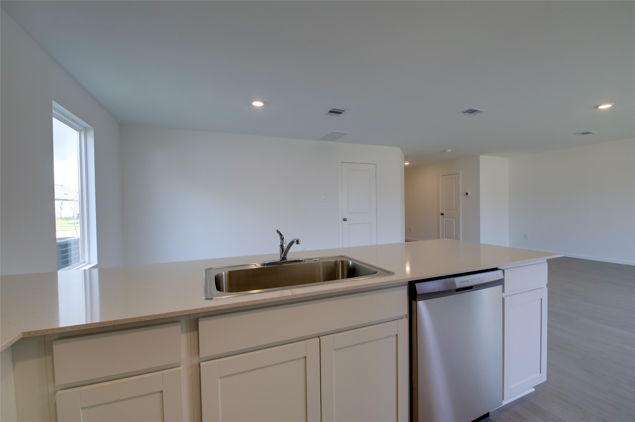10915 Tawny Rdg Drive Beasley, TX 77417 - Photo 13 of 33 a kitchen with a sink and cabinets