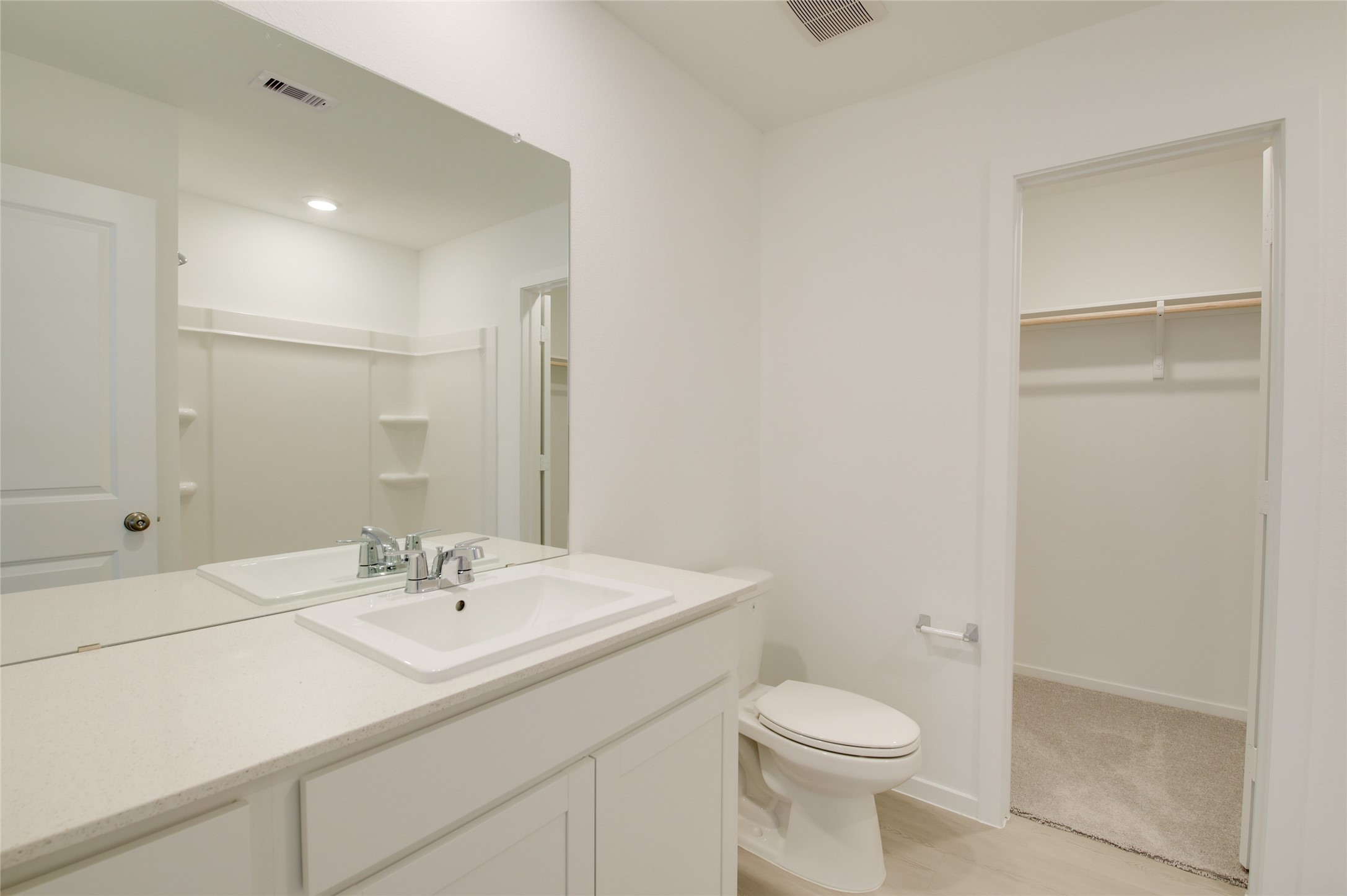 10915 Tawny Rdg Drive Beasley, TX 77417 - Photo 18 of 33 a bathroom with a sink toilet and vanity