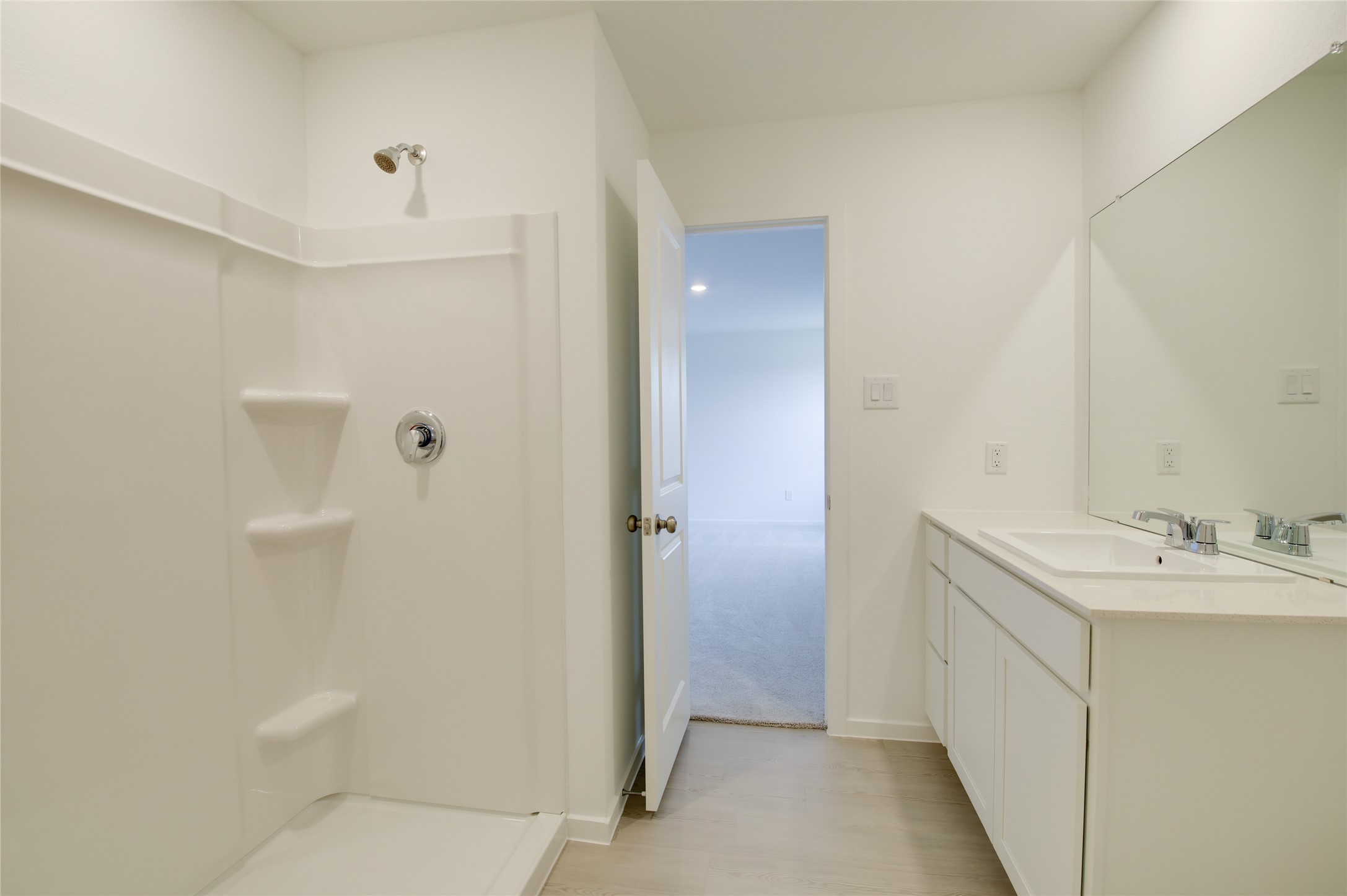 10915 Tawny Rdg Drive Beasley, TX 77417 - Photo 19 of 33 a bathroom with a sink and mirror