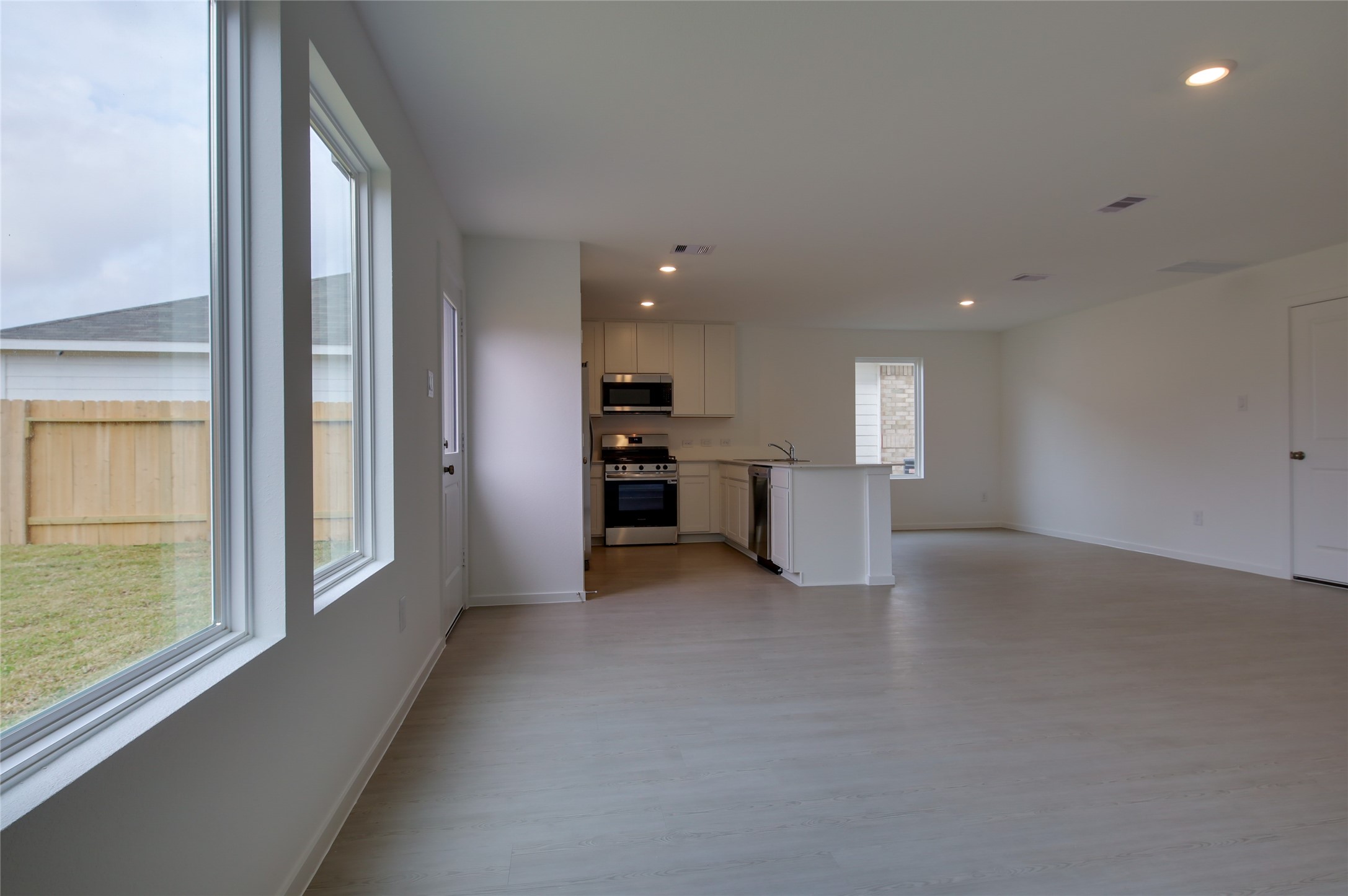10915 Tawny Rdg Drive Beasley, TX 77417 - Photo 8 of 33 a view of a kitchen with furniture and a kitchen