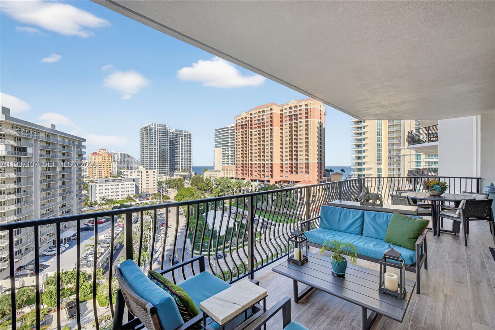 100 South Birch Road, Unit 1103F Fort Lauderdale, FL 33316 - Photo 19 of 80 Actual balcony. New plank wood look tile flooring. Expansive balcony w/ room for dining, lounge seating and electric grill. With gorgeous water views.