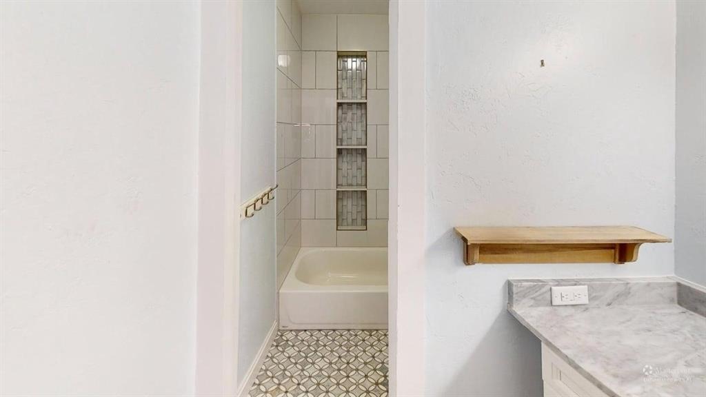 5805 Ranger Drive Rockwall, TX 75032 - Photo 15 of 24 a bathroom with a sink and a shower