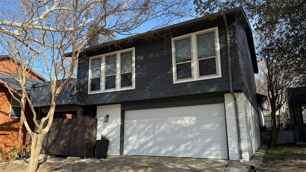 5805 Ranger Drive Rockwall, TX 75032 - Photo 2 of 24 a view of a house with a large tree