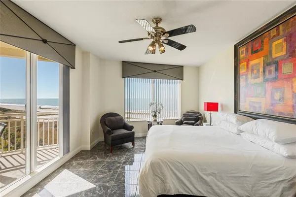 a view of a balcony with an ocean view