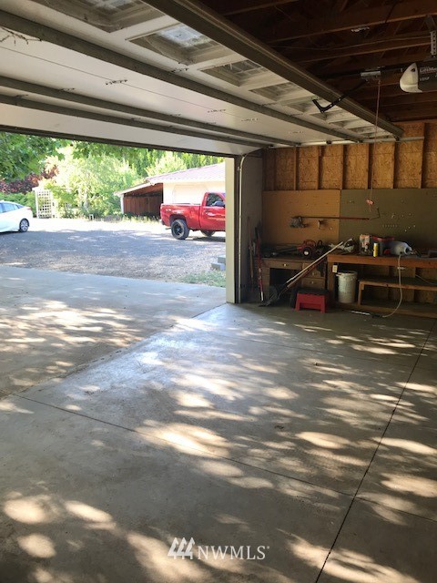 91 Hideaway Road Yakima, WA 98908 - Photo 25 of 25 a view of a garage with a car