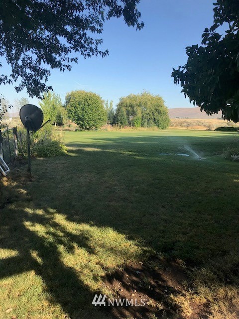 91 Hideaway Road Yakima, WA 98908 - Photo 7 of 25 a view of a lake with a yard