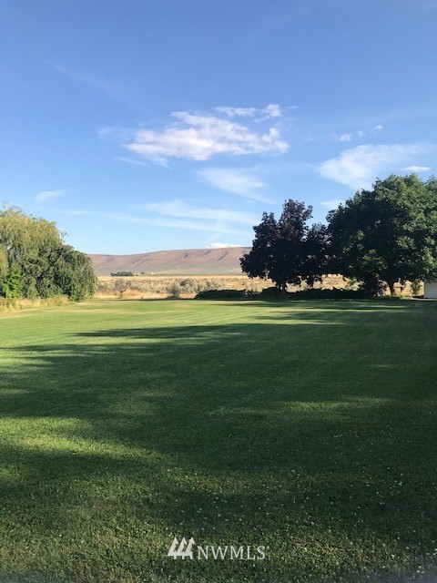 91 Hideaway Road Yakima, WA 98908 - Photo 10 of 25 a view of a golf course with a lake