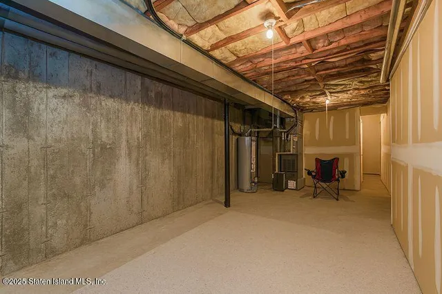a view of a room with wooden walls