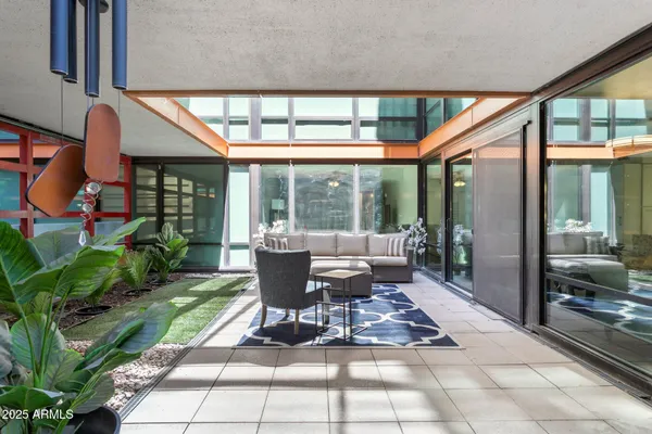 a outdoor space with chairs and couch