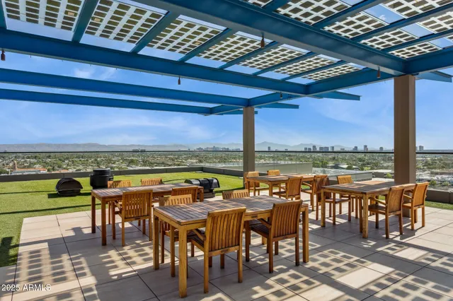 a view of a balcony with furniture