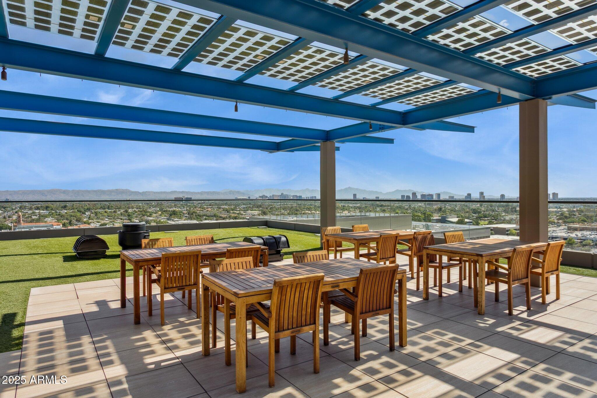 4808 North 24th Street, Unit 208 Phoenix, AZ 85016 - Photo 27 of 31 a view of a balcony with furniture