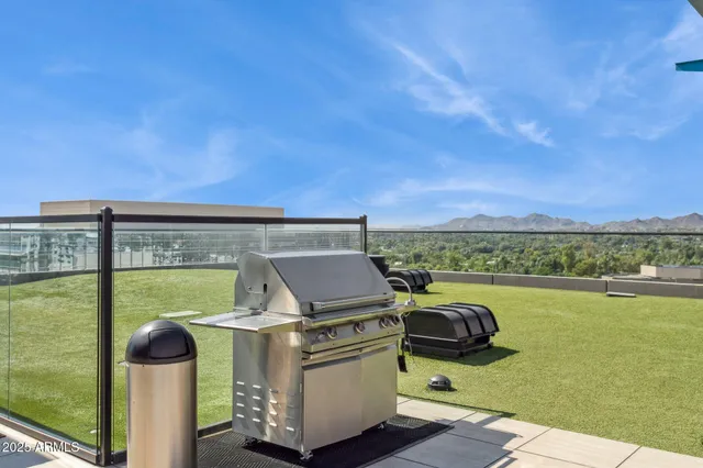 a view of a balcony with an ocean